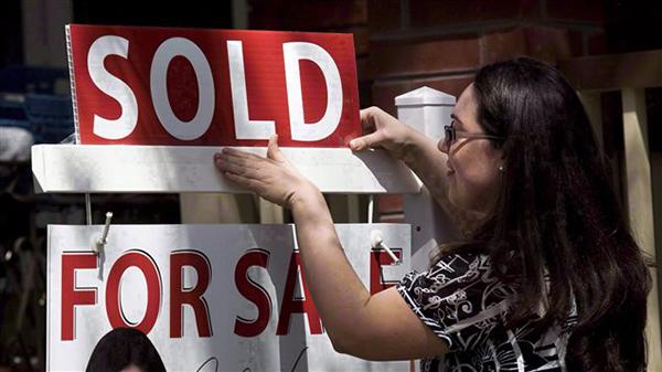 新房贷法规下周一出台 缓解房市过热