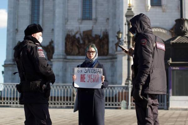 Russia’s feminists are protesting the war and its propaganda with stickers, posters, performance and graffiti